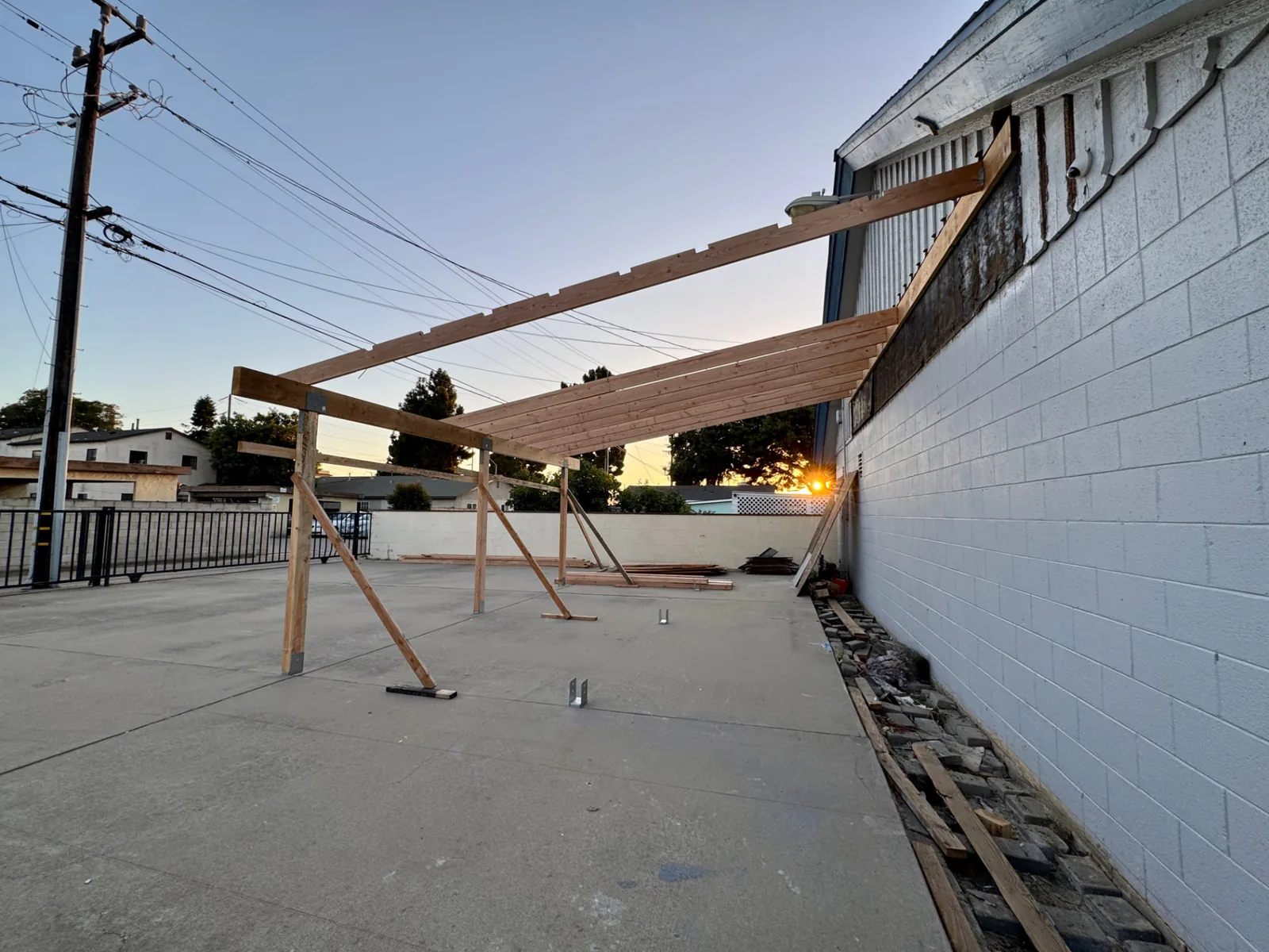 Roof framing and rafters installed on an attached commercial carport in Santa Maria